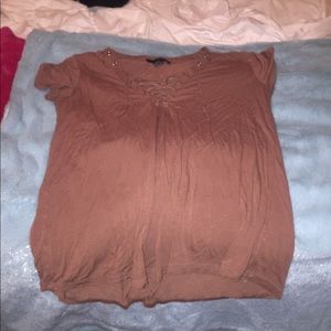 A rusty red/orange shirt